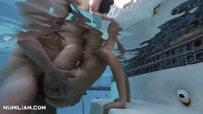 Splashin' it hot & heavy under the waves Splashin' it hot & heavy under the waves