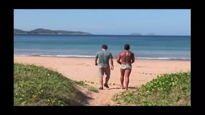 Sexy Brazilian babe strips nude on beach, flaunting flawless figure