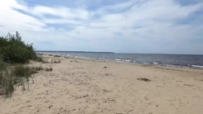 Sexy Milf Spreads Legs in Tiny Bikini on Scorching Sand