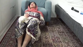 Arabian seductress indulges in intense solo play with massive black toy, climaxing intensely