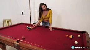 MILF Harlow gets up on a pool table and plays with her pussy