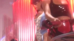 Masked latex subs toyed with by lesbian dominatrix