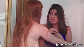 Redhead MILF seduces stepdaughter into lesbian threesome