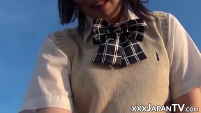 Shy Japanese chick using large dildo at a secret location