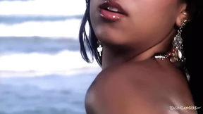 Two really attractive women engaged in intimate and intense sexual activity with a man on the beach Two really attractive women engaged in intimate and intense sexual activity with a man on the beach
