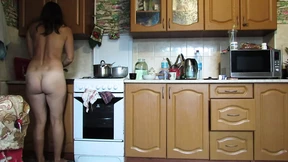 Naked hostess in the kitchen Naked hostess in the kitchen