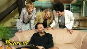 Three Excited Older Women Enjoy One Man Together