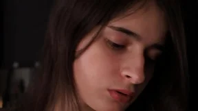 Nude photo session with a youthful dark-haired beauty