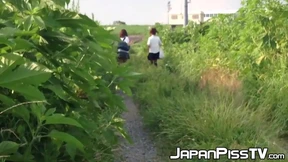 Schoolgirls from Japan peeing while taking a hike