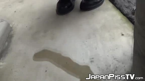 Teenage Asian redhead filmed while peeing on the street