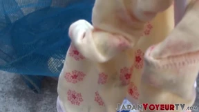 Japanese babe secretly filmed peeing in public