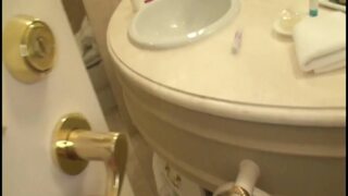 A Smooth-skinned Beauty Shares a Tender Moment Beneath the Warmth of the Shower