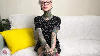 Tattooed student fingering her pussy to shaking orgasm