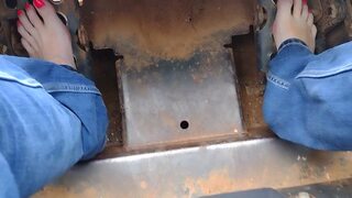 Pedal pumping a Bobcat tractor &mdash;  start with socks & shoes then I removed them and pumped barefooted