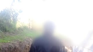 Mature grandmother walking naked outdoors