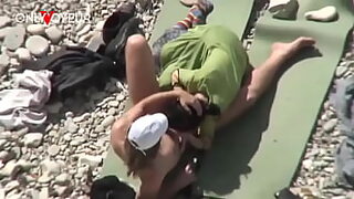 Couples get down dirty under sun-kissed sands