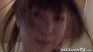 Japanese teen cutie massages cock with feet before riding