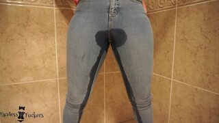 Wife pissing her jeans