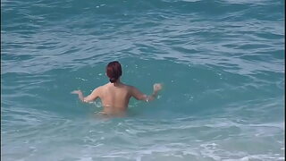 Red head with fine ass Sunning tits on the beach